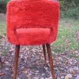 2 chairs red rug seventies