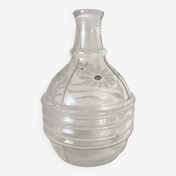Old carafe, daisy decorated vase