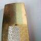 Vintage glass wall sconce from the 1960s in brass, mid-century light.