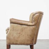 Fauteuil en cuir subtil avec coussin d'assise réversible en kilim