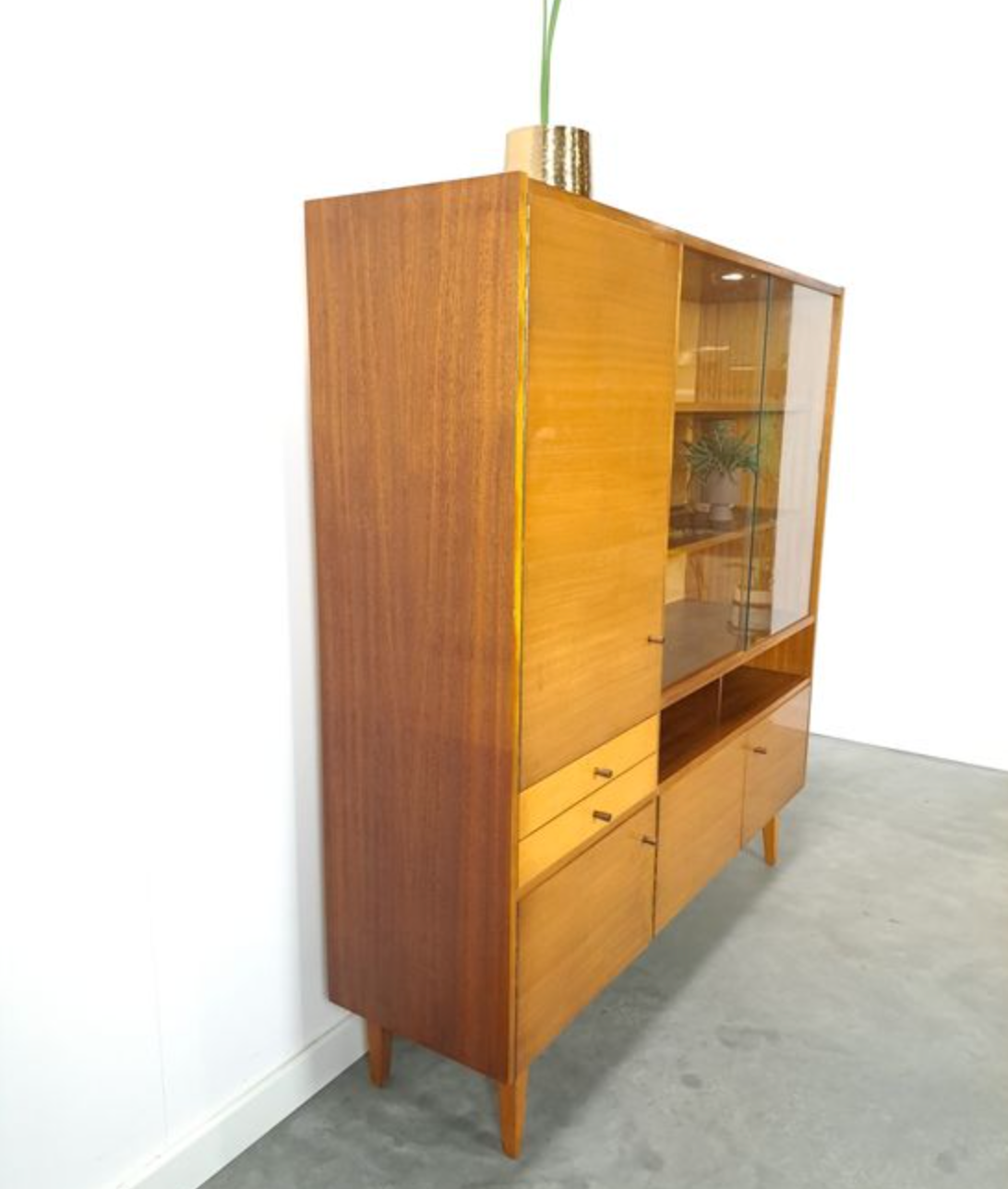 Vintage wooden sideboard with sliding glass doors and drawers