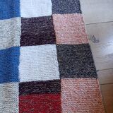 Hand knitted patchwork plaid
