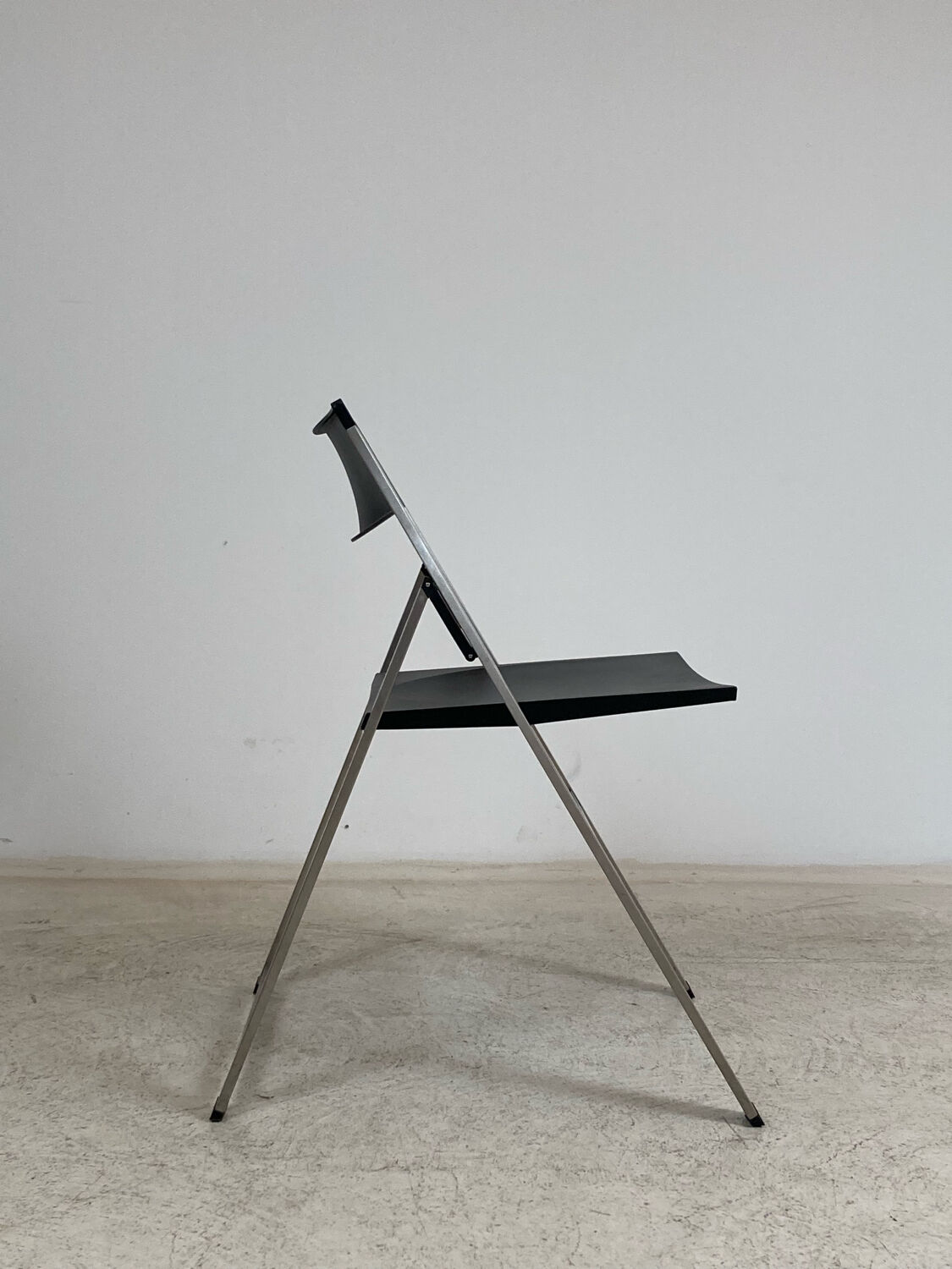P08 folding chairs by Justus Kolberg for Tecno 1991