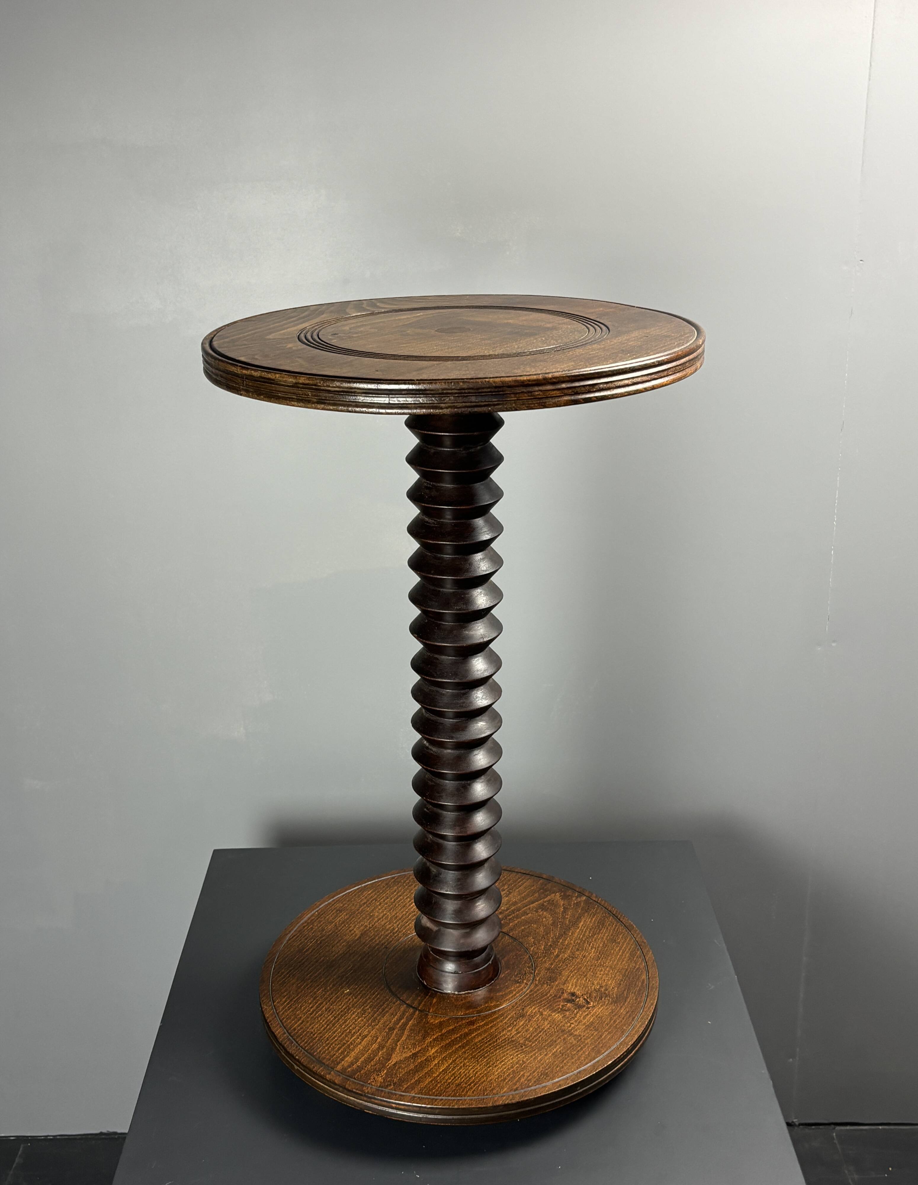 Midcentury brutalist wood turned side table in the style of Charles Dudouyt