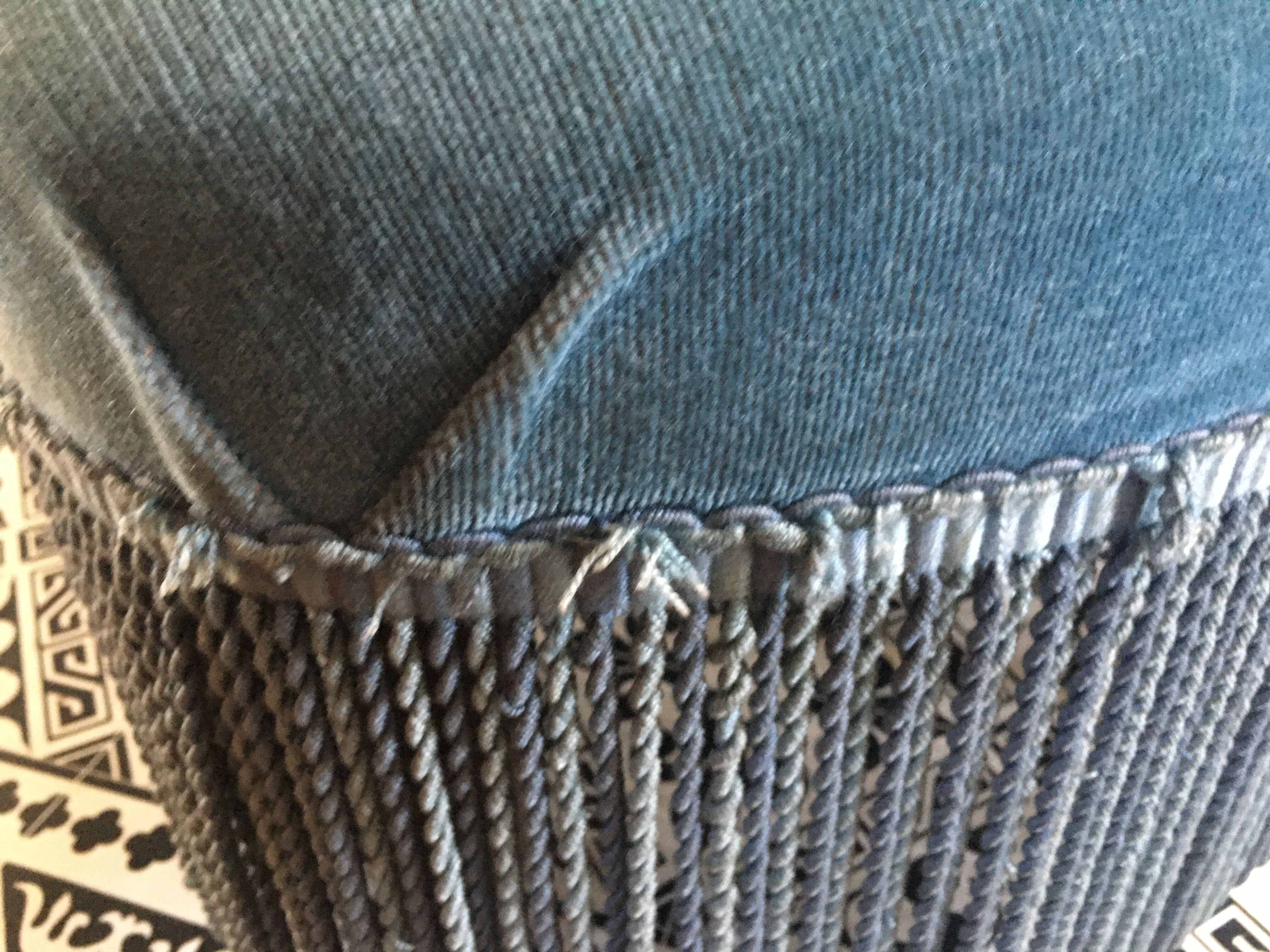 Blue heater with fringed medallion shape