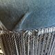 Blue heater with fringed medallion shape