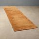 Ancient Asian wool rug, hand-knotted, 118 x 31 in.
