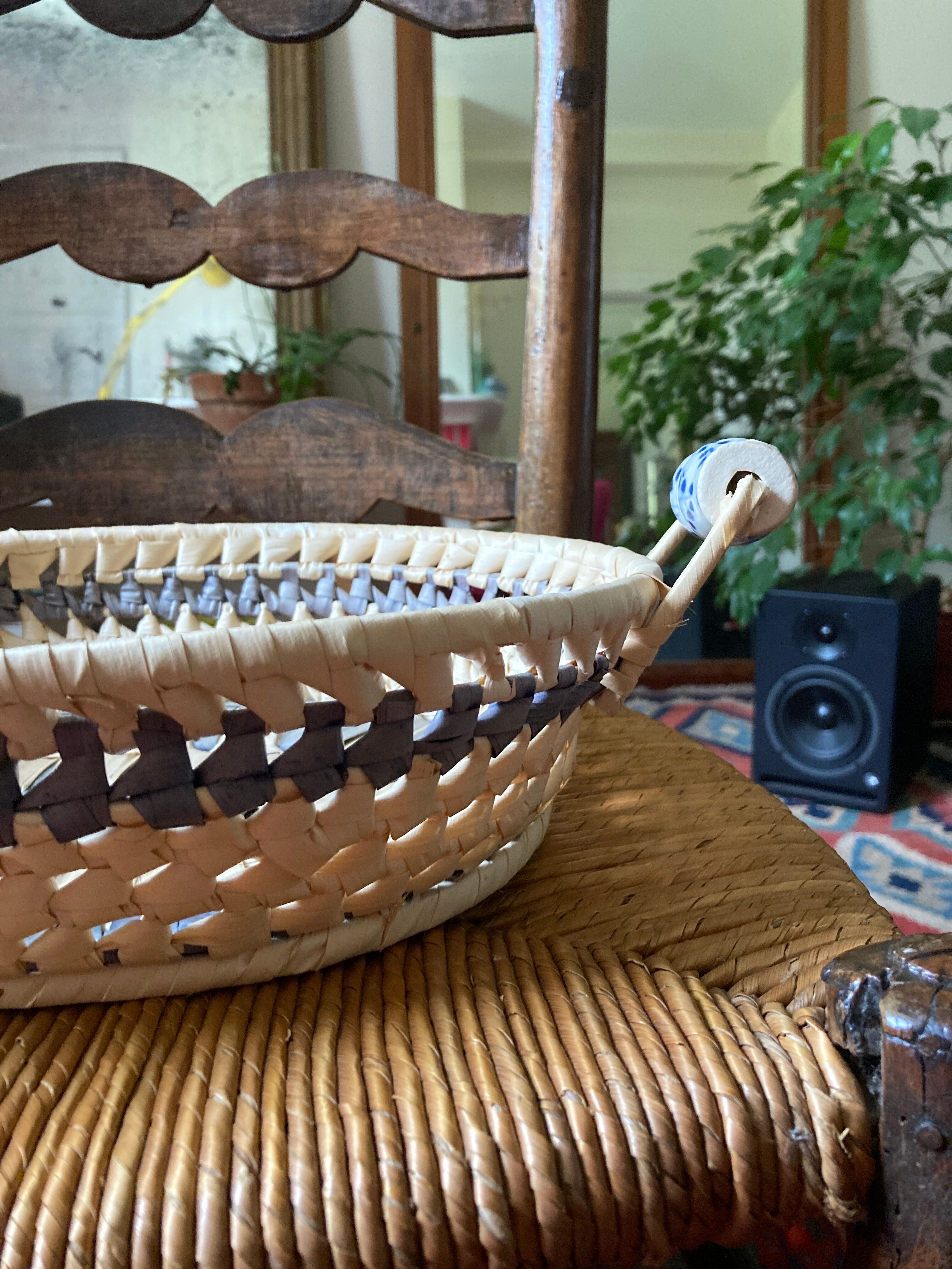 Wicker basket and vintage asymmetrical antique ceramic