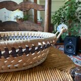 Wicker basket and vintage asymmetrical antique ceramic