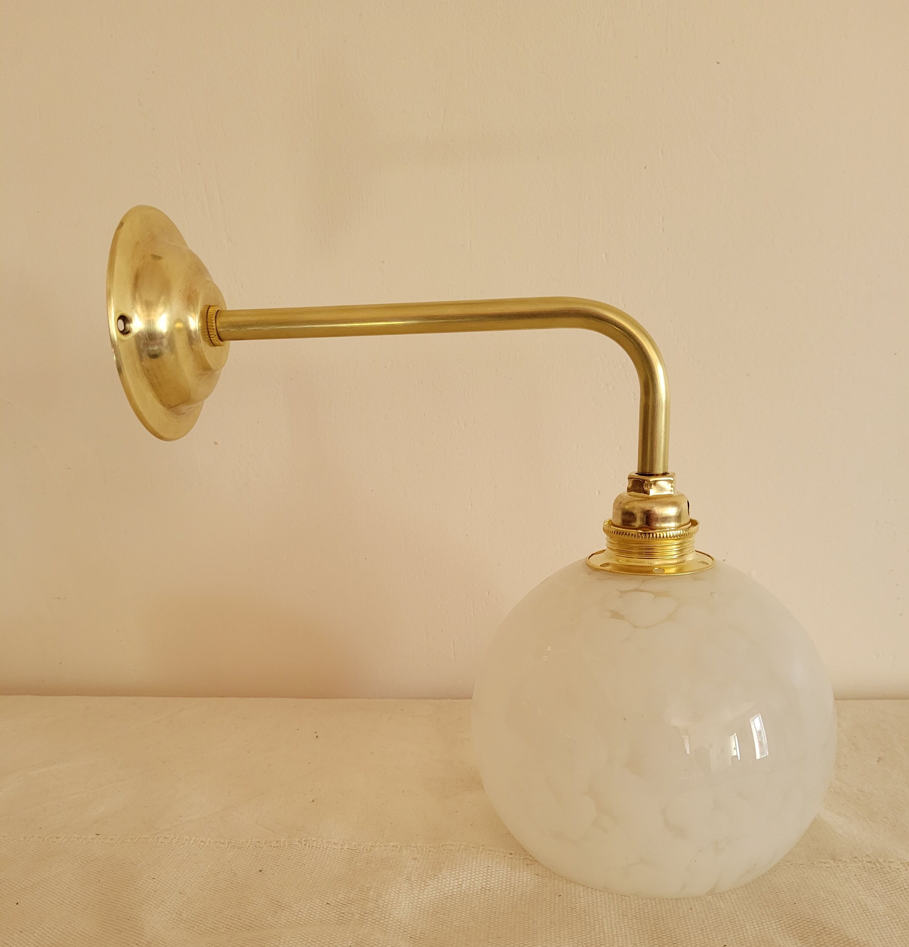 Brass and Clichy glass wall lamp