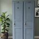 Vintage grey wooden wardrobe from 1914.