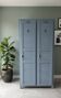 Vintage grey wooden wardrobe from 1914.