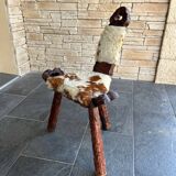 Vintage brutalist tripod chair in wood and leather