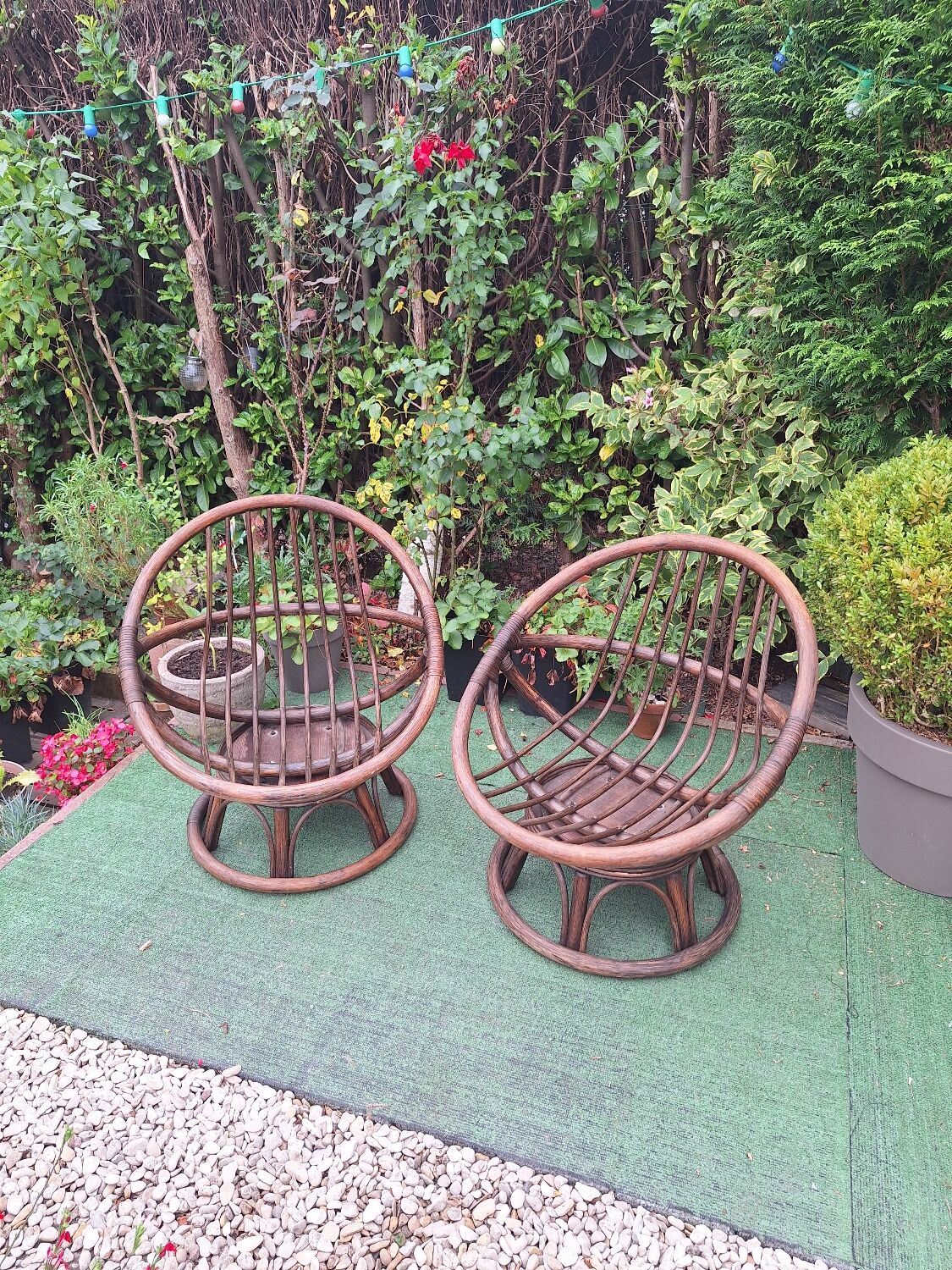 Pair of vintage rattan swivel armchairs