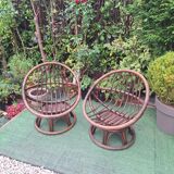 Pair of vintage rattan swivel armchairs