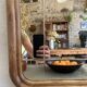 Art nouveau mirror, curved wooden frame and chiseled glass