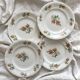 4 polychrome ironstone dessert plates with flowers, KG Lunéville