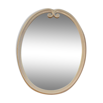 Vintage enameled metal oval mirror