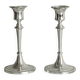Pair of white metal candlesticks