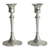 Pair of white metal candlesticks