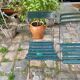 Salon de jardin, table et 4 chaises pliantes en métal vert