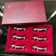 Series of vintage Dachshund knife holders in silver metal