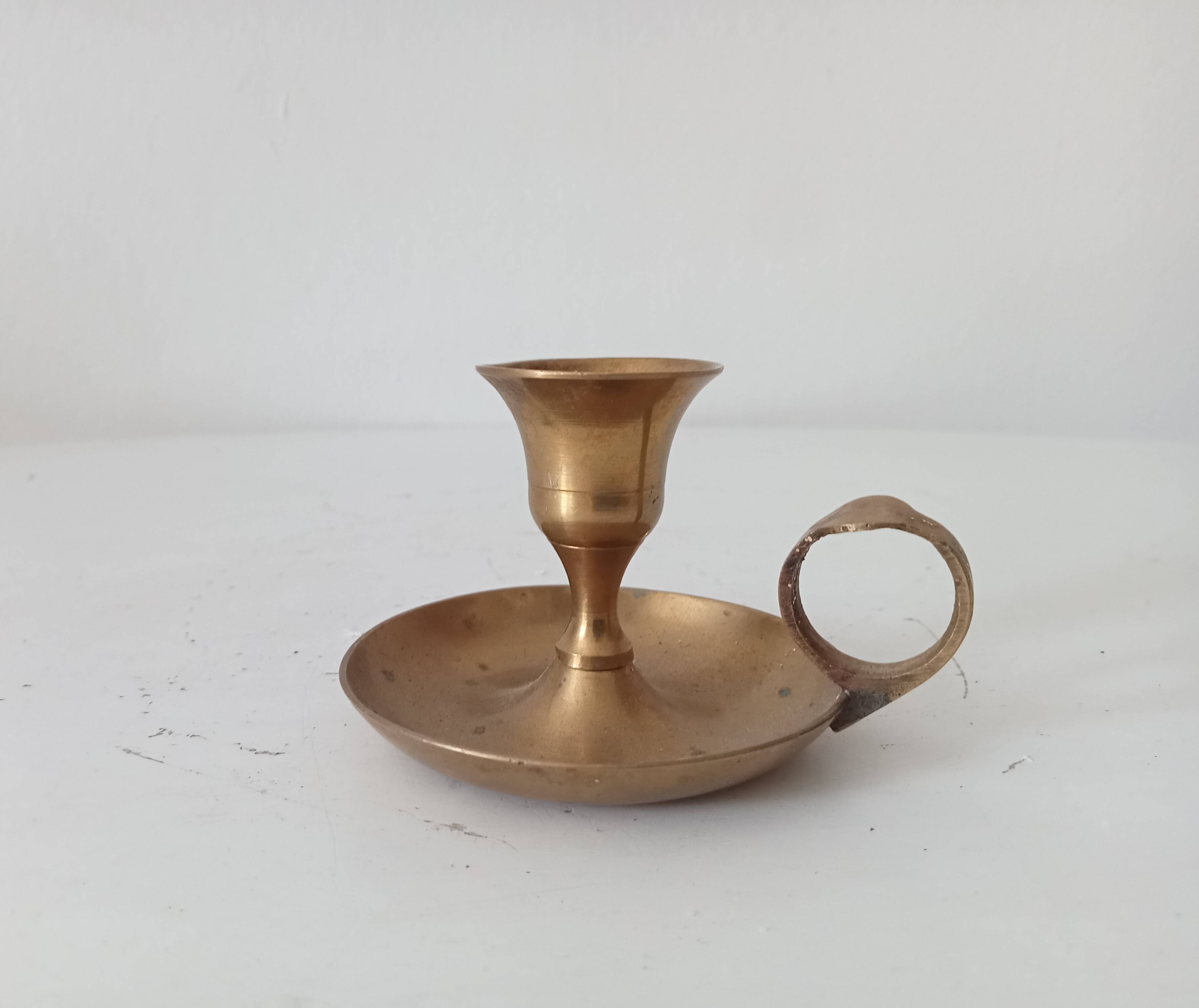 Vintage brass hand candle holder