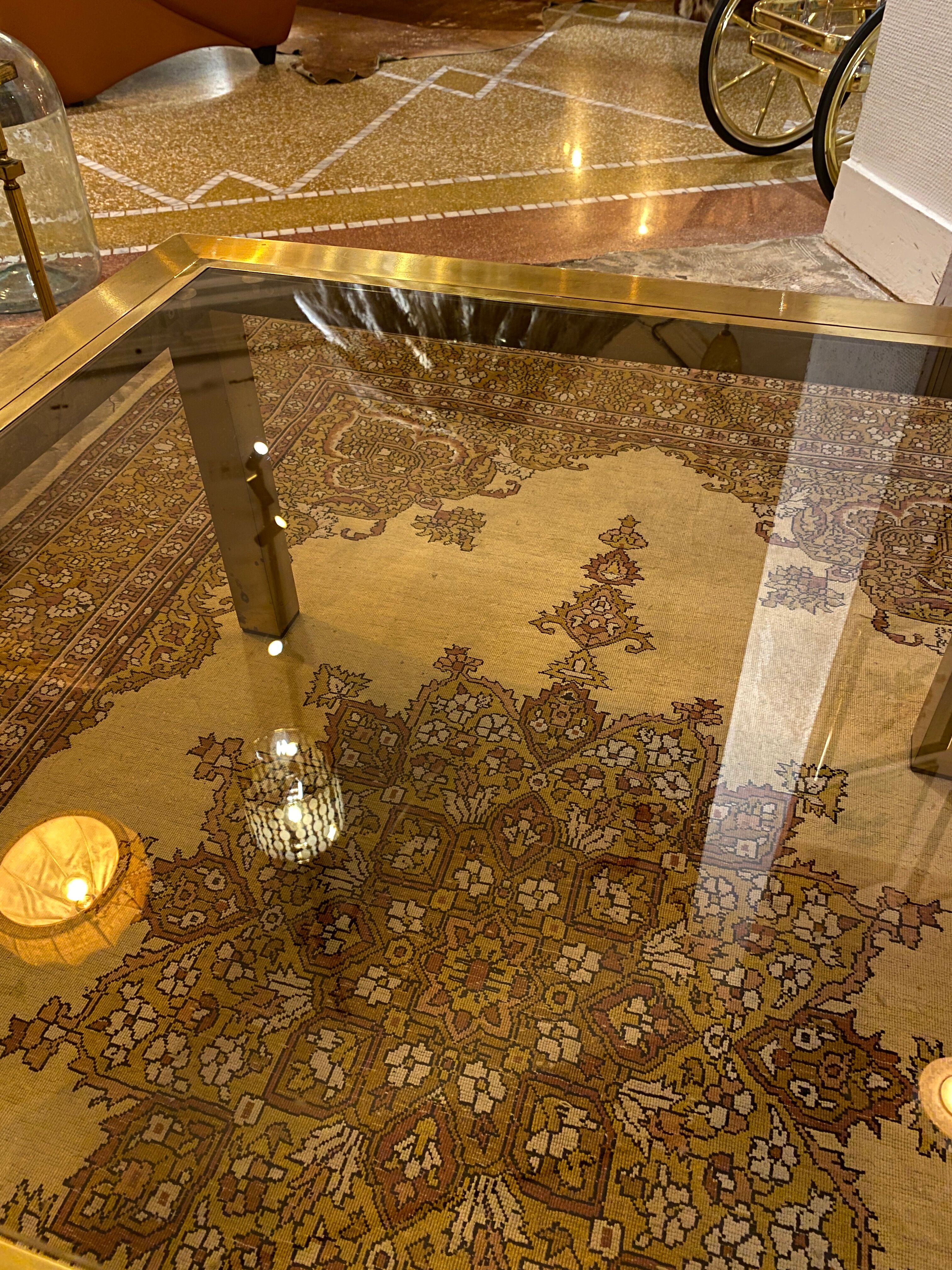 Gold square coffee table and smoked glass