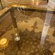 Gold square coffee table and smoked glass