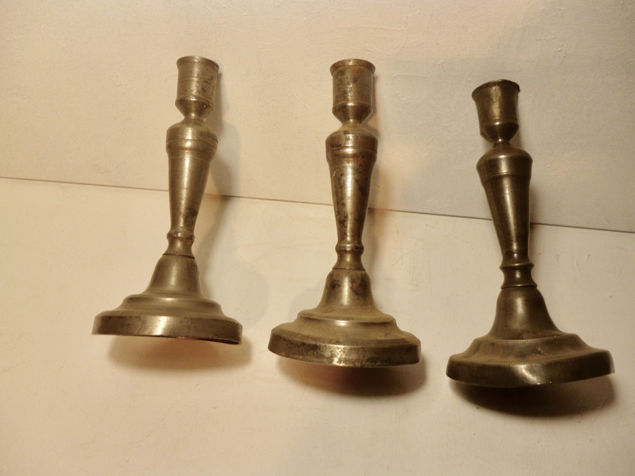 Tin candlesticks