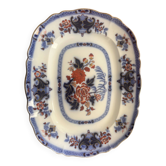 Large hollow dish in fine earthenware with Japanese decoration.