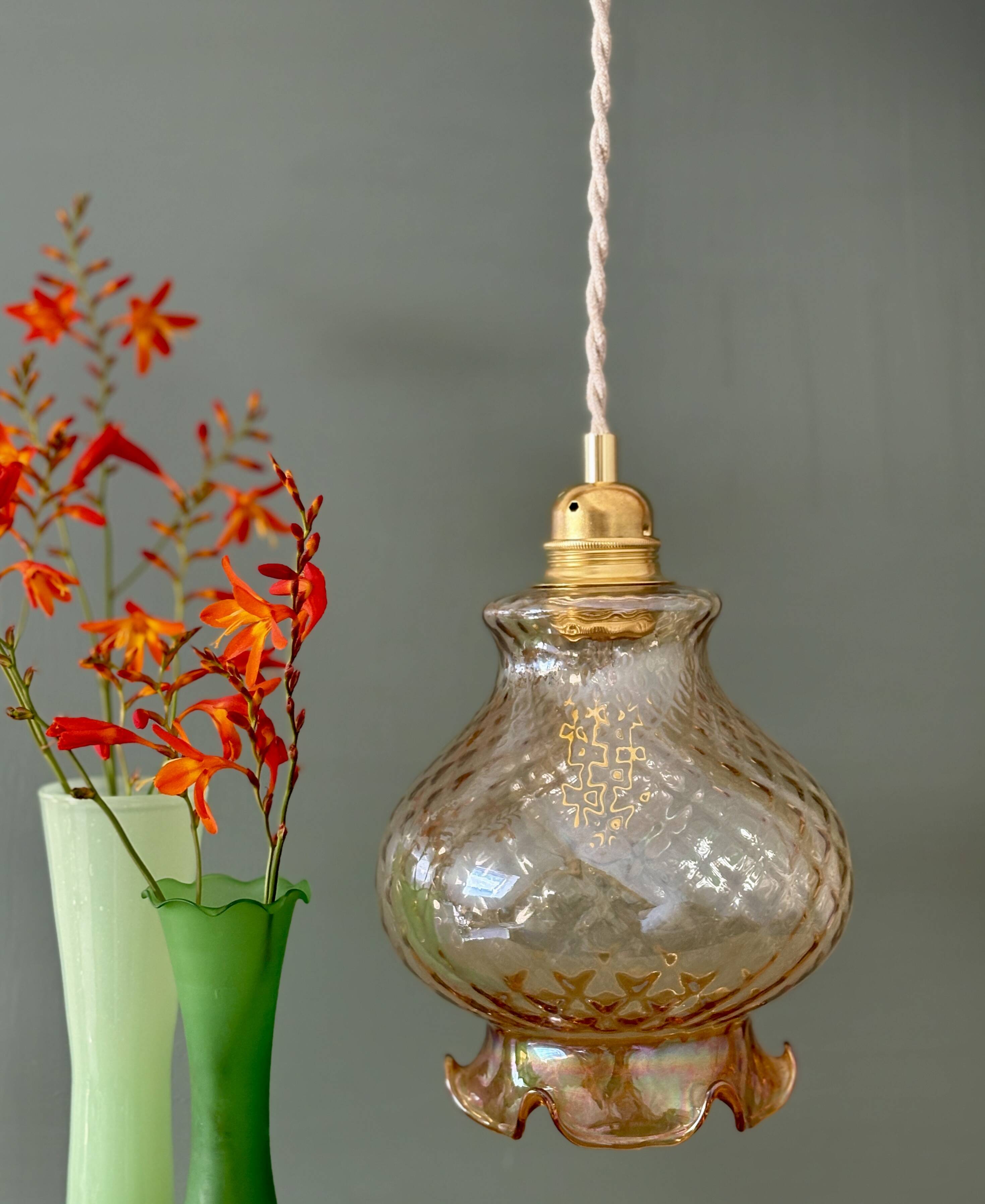 Vintage amber glass suspension globe