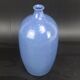 Signed enamelled terracotta bottle vase