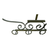 Wall mounted wrought iron coat rack from the 1970s
