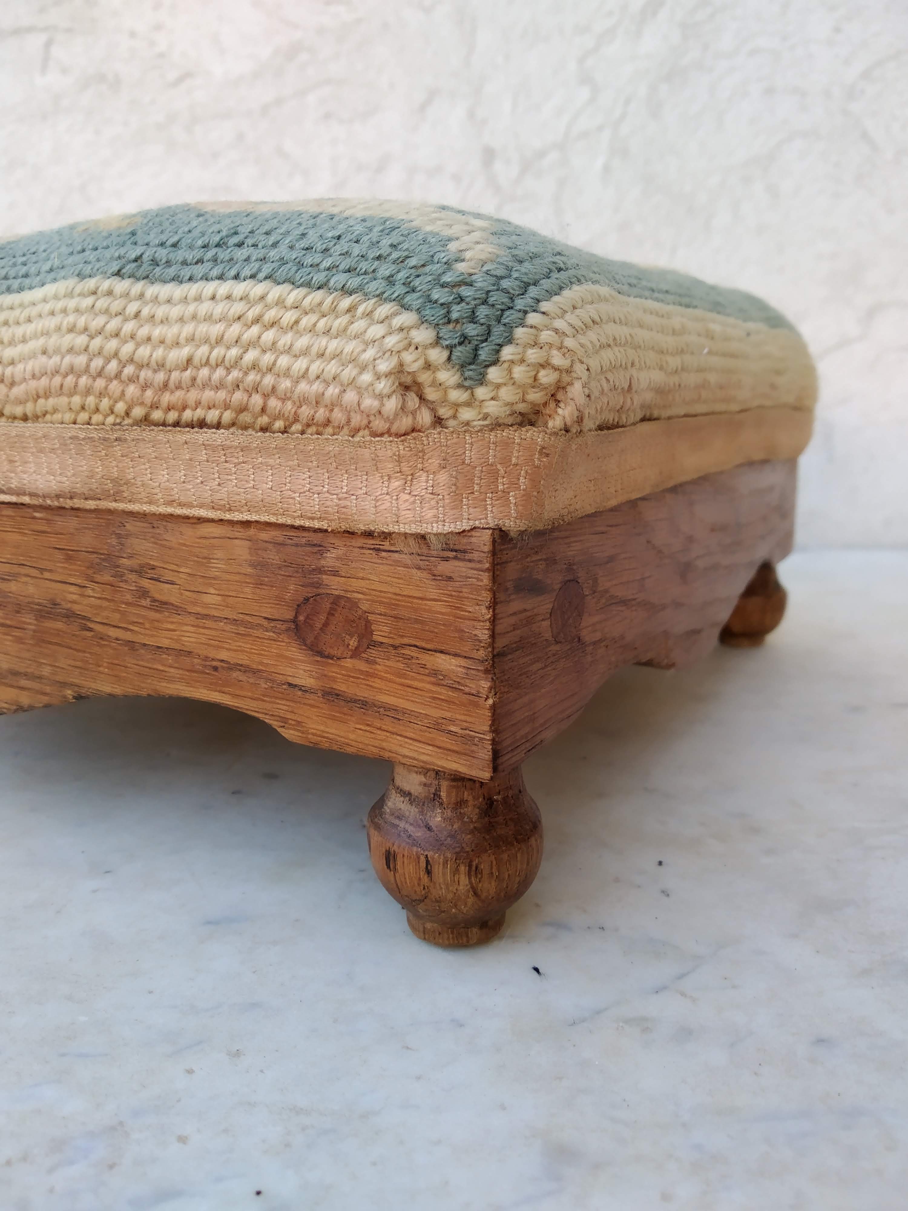 Small antique footrest stool lined canvas