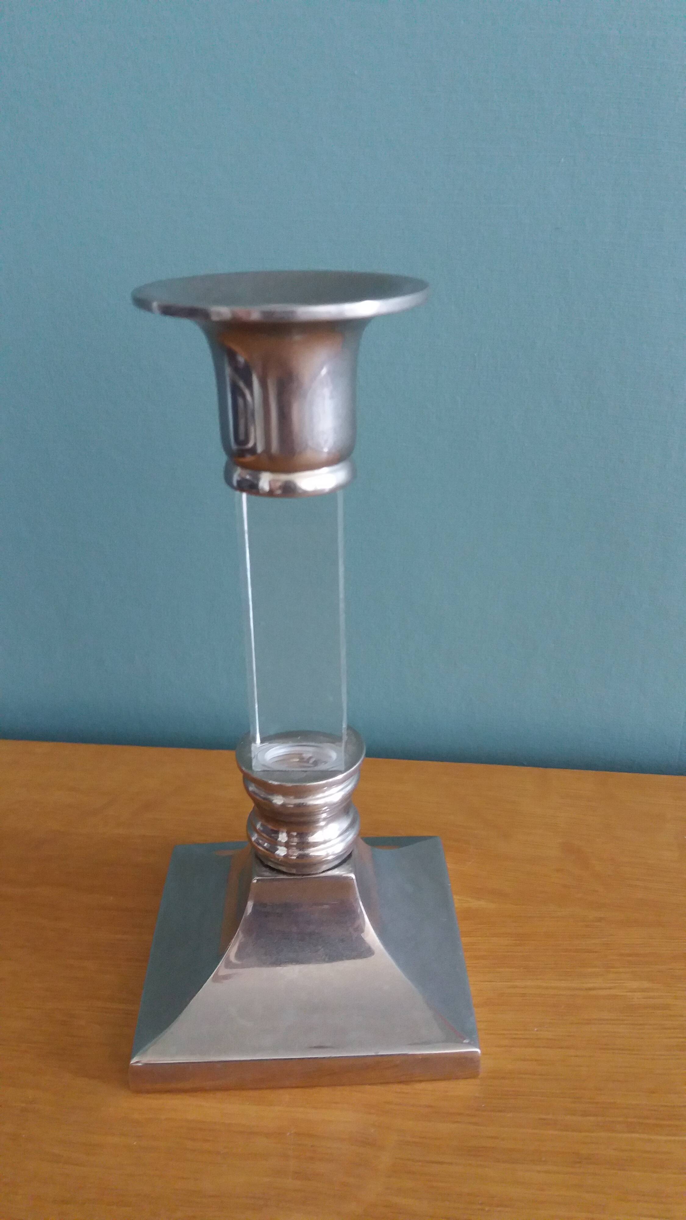 Silver-plated metal candlestick and lucite plexiglass