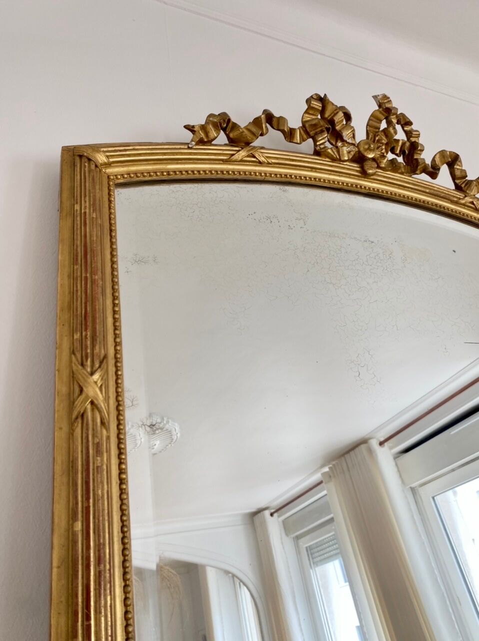 Louis XVI mirror, 19th century, gilded with sheet 136x88cm