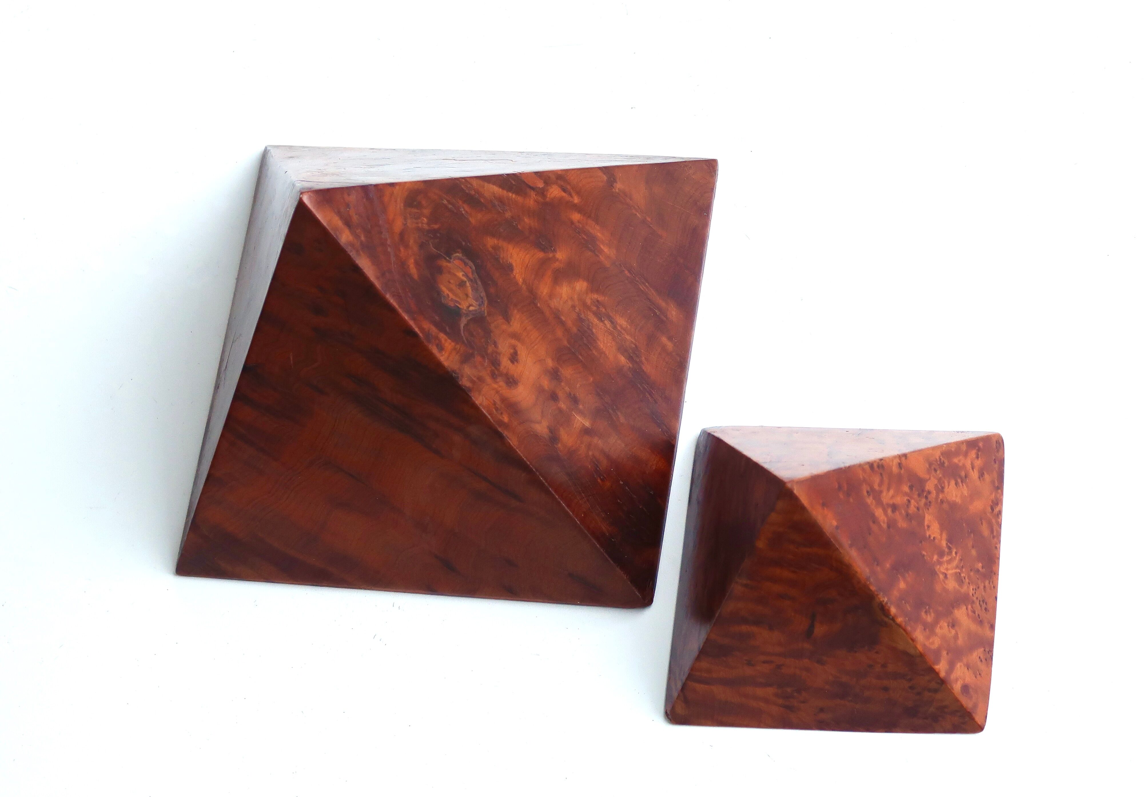 Two wooden pyramids with elm magnifying glass, 70s