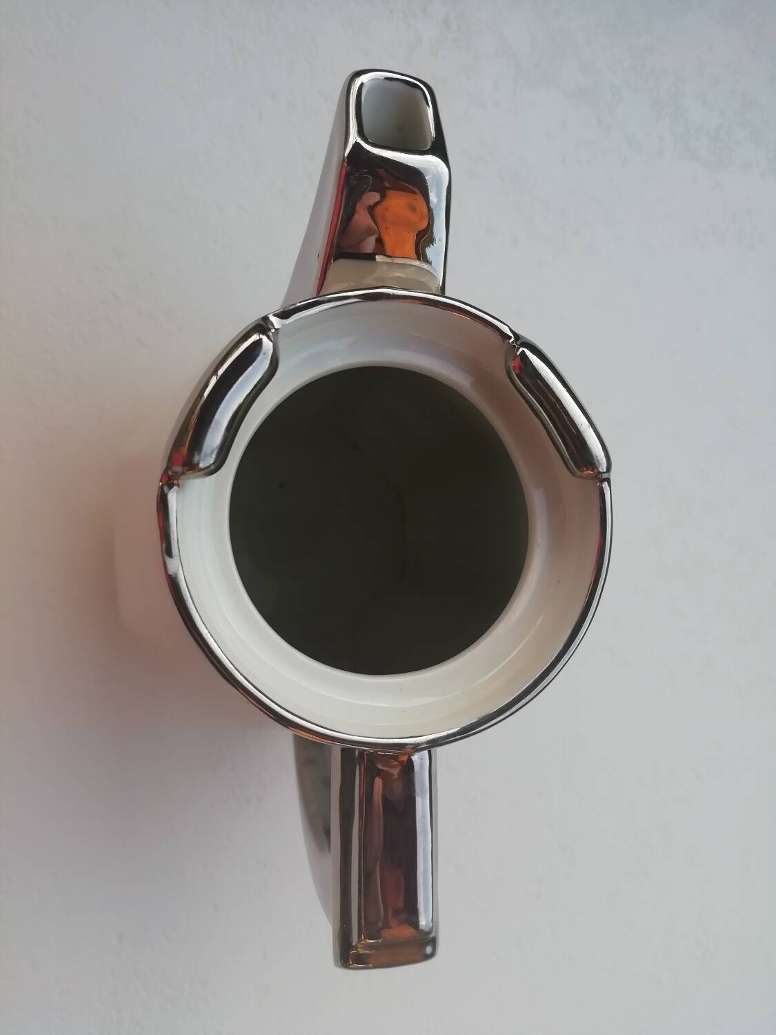 Pair of milk jug teapots