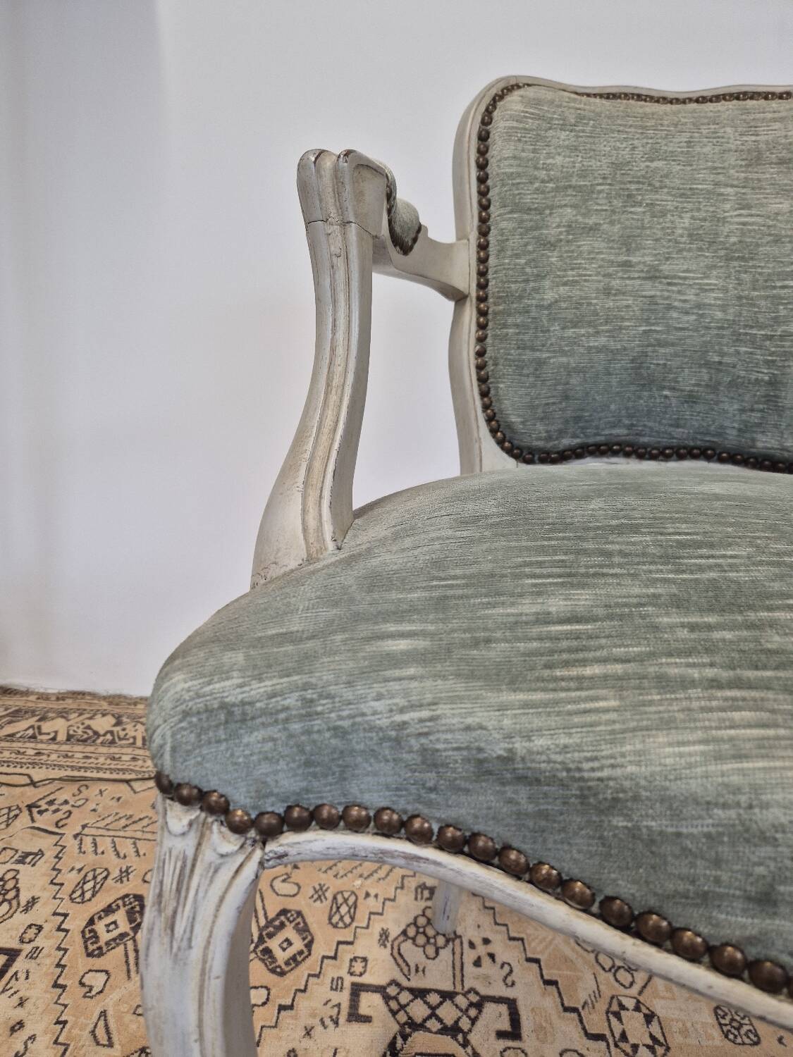 Louis XV style cabriolet armchair in patinated wood and velvet