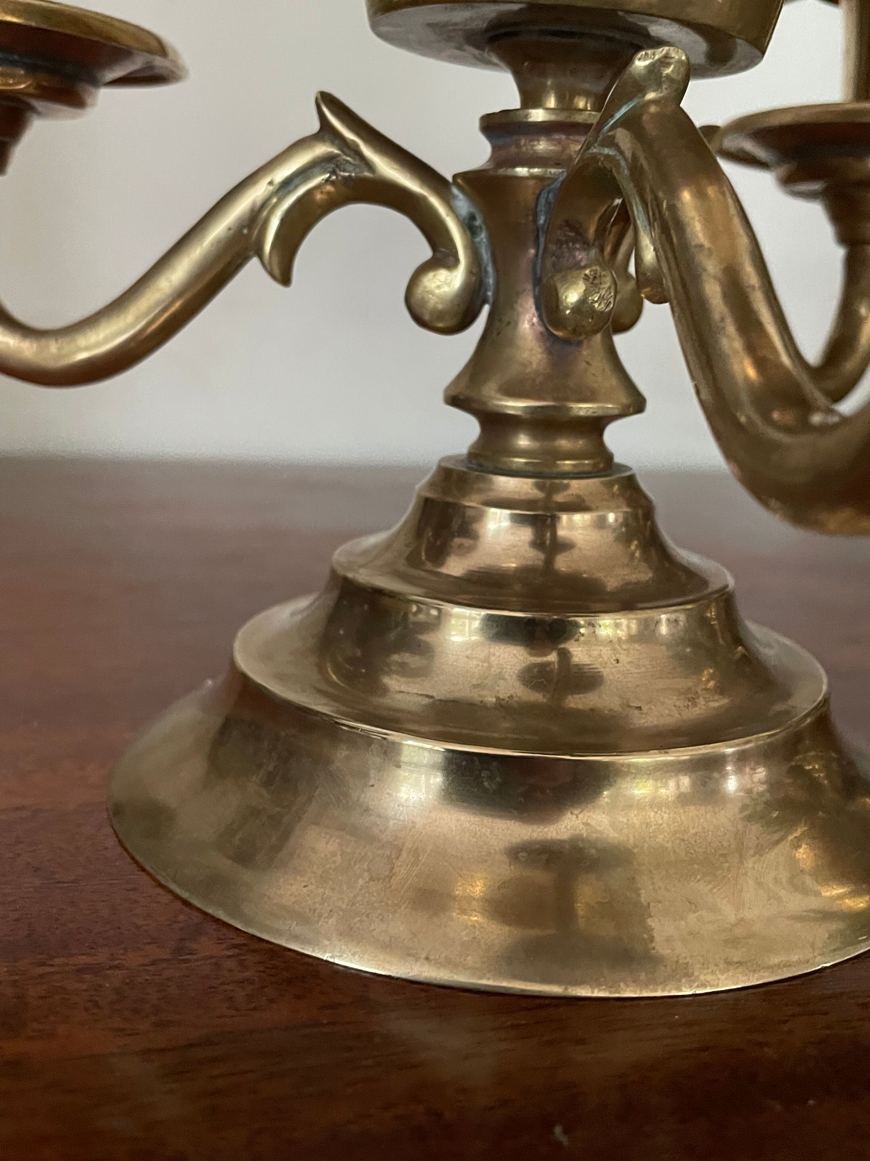 Pair of solid brass calyx candlesticks