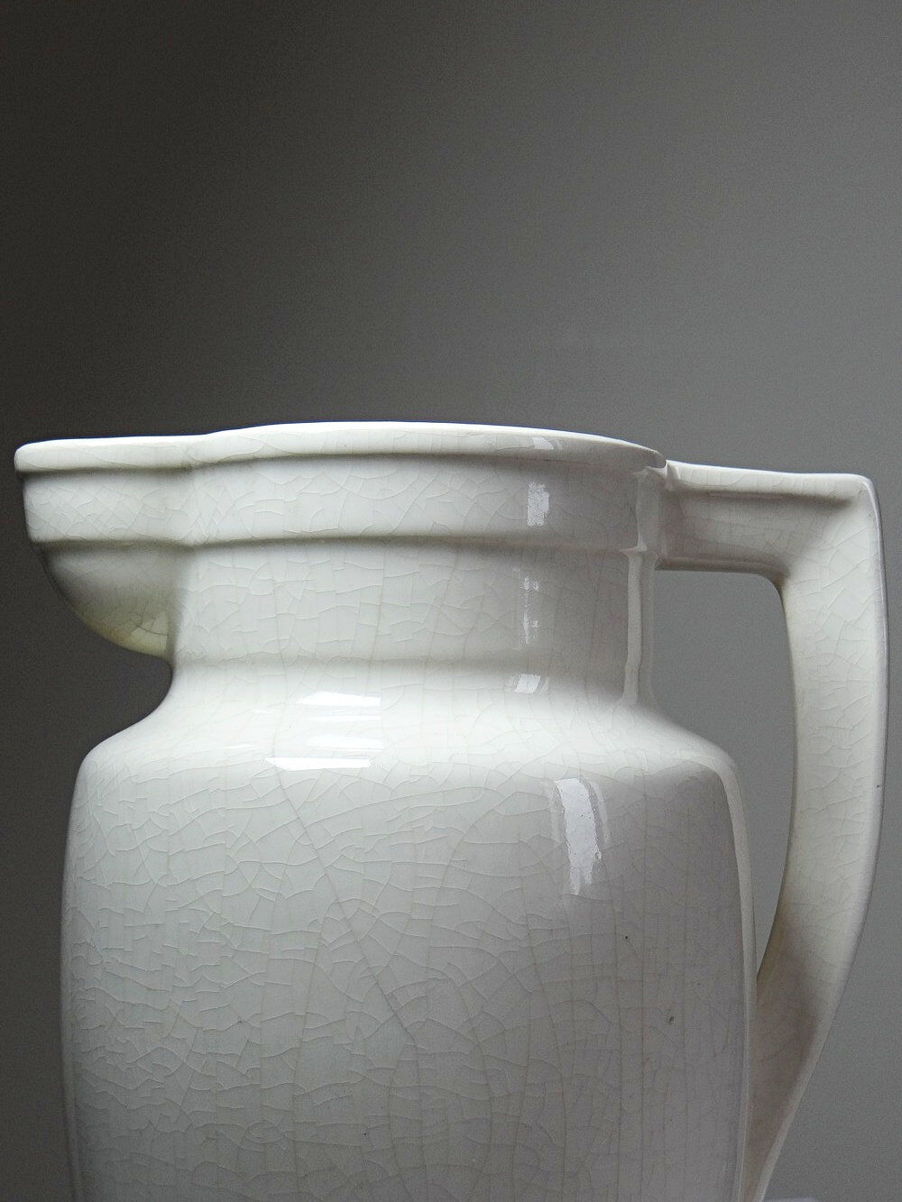 Large Art Deco toilet bowl, antique cracked faience.