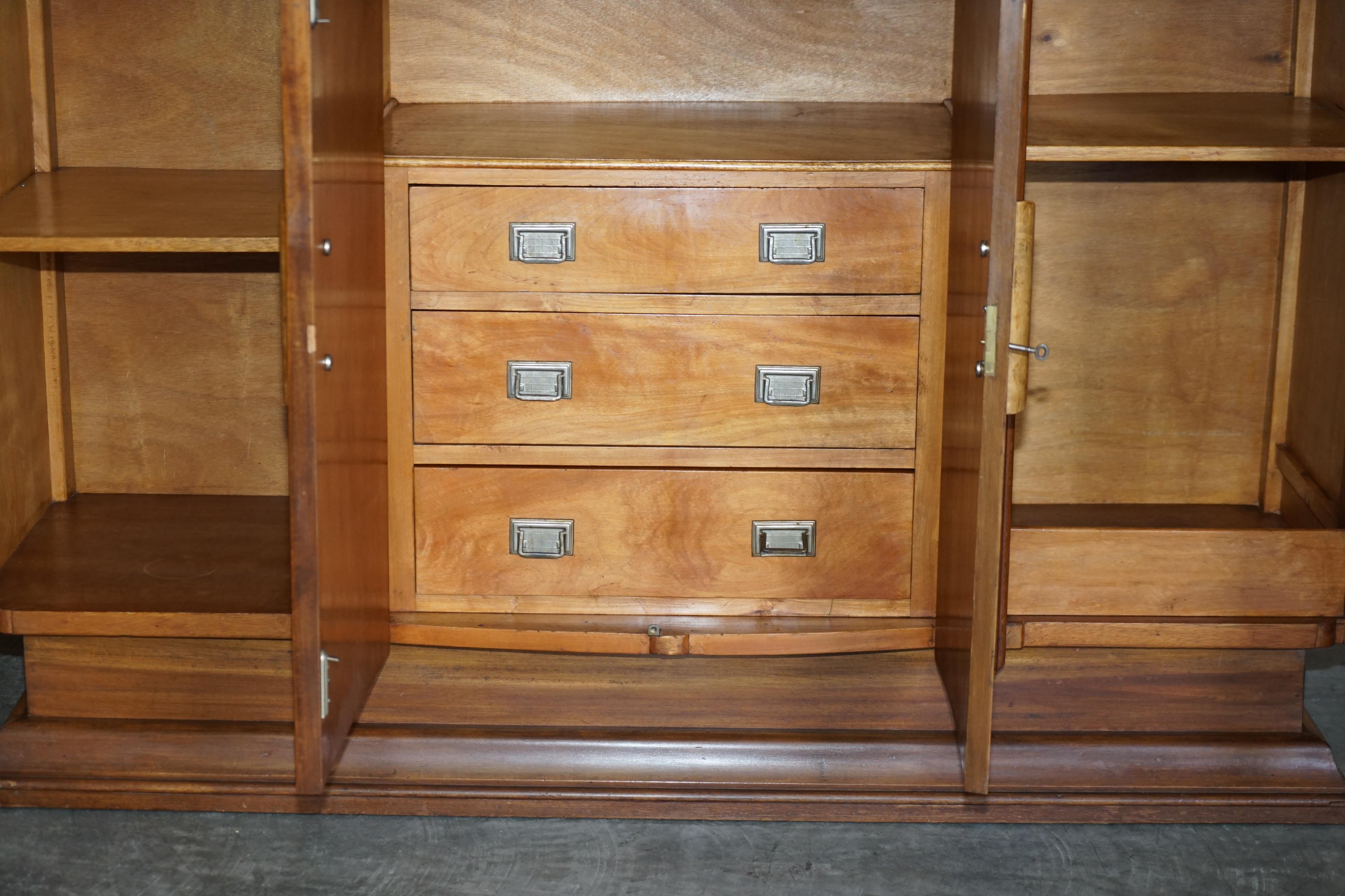 Art Deco walnut burr sideboard with drawers and bar.