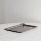 Small vintage metal tray with decorative knot