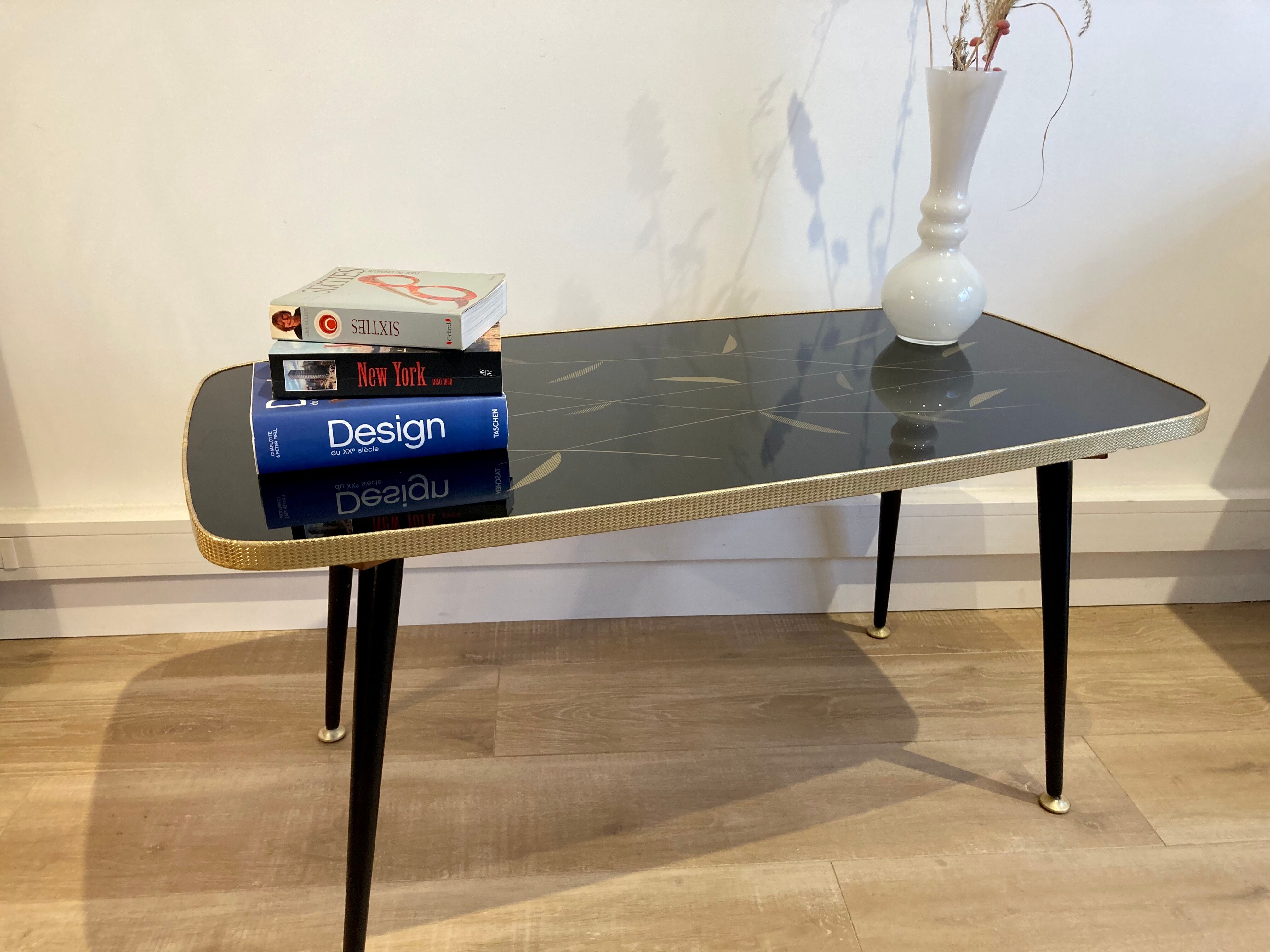 Black glass coffee table wooden legs 60s