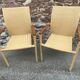 Pair of colonial-style rattan and wood armchairs