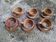 6 stoneware coffee cups and saucers
