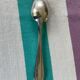 12 small silver metal spoons