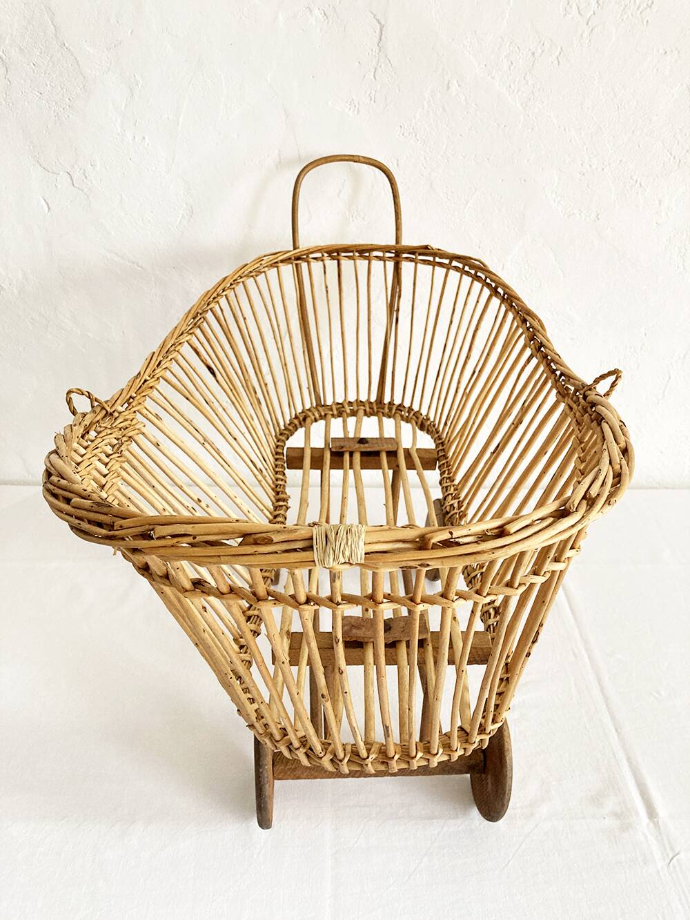 Old rattan doll's pram