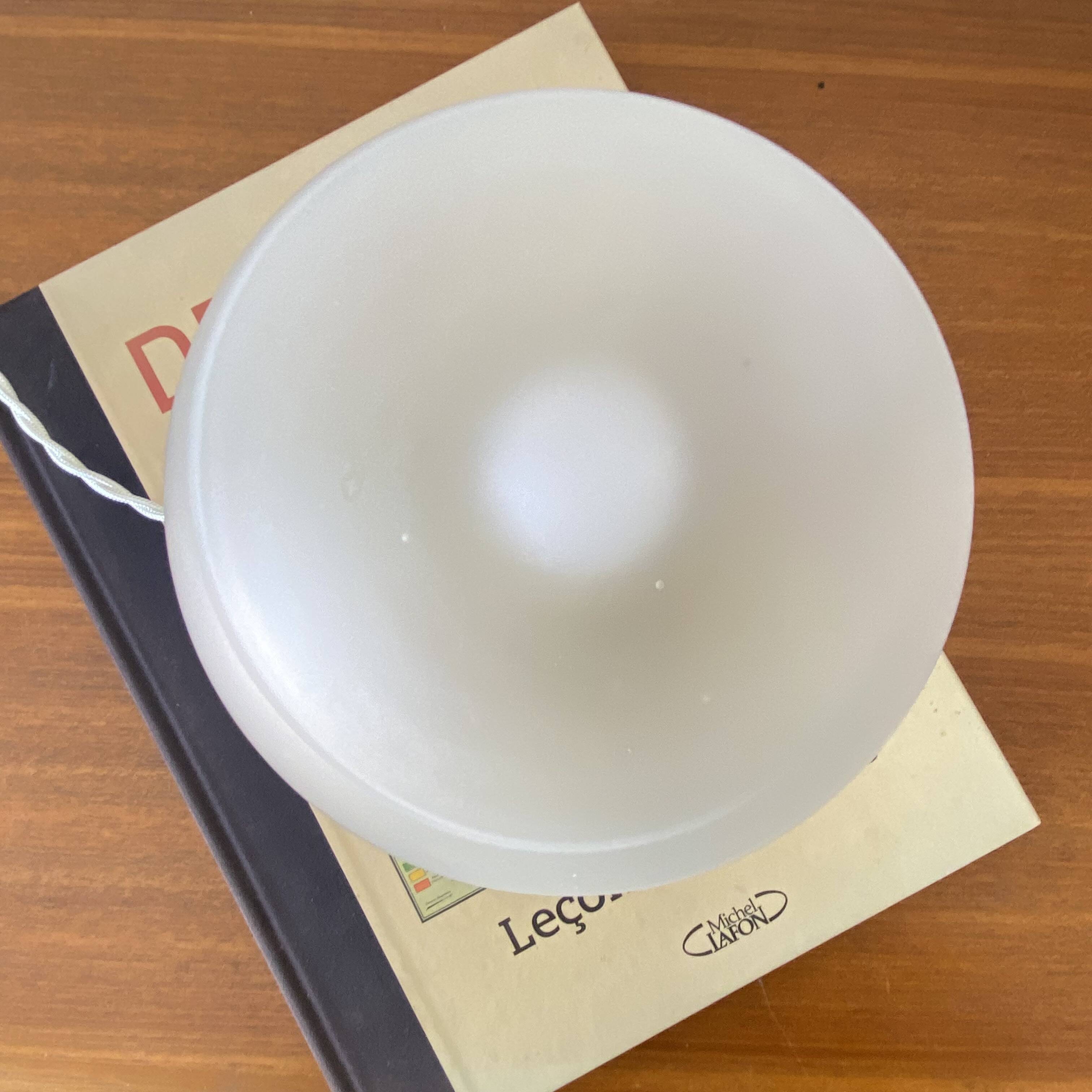 Vintage desk table lamp in antique glass with a brass base.